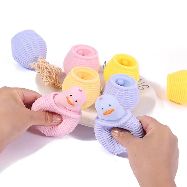 Duck Squishy Pop Out from Cage Kids Toy (5).jpg