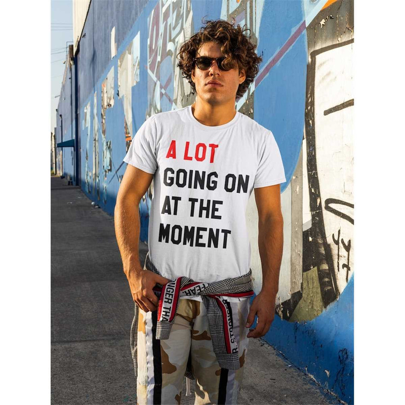 MR-1842023135619-a-lot-going-on-at-the-moment-new-eras-mens-t-shirt-2023-eras-image-1.jpg