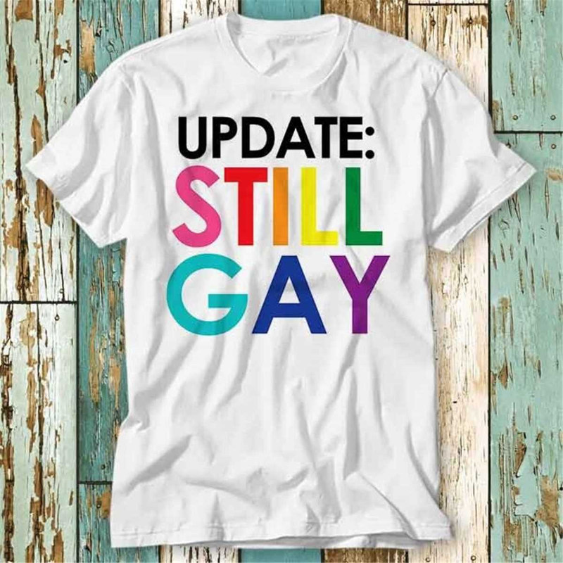 MR-1942023124346-update-still-gay-not-a-phase-t-shirt-top-design-unisex-ladies-image-1.jpg