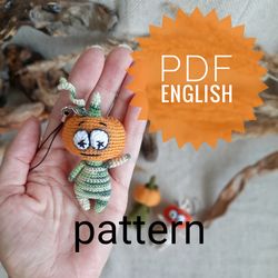 Crochet pattern for a soft toy pumpkin monster. Keychain. mini amigurumi.