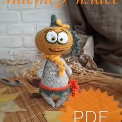 crochet pattern for a soft toy pumpkin monster. amigurumi.