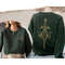 MR-204202310042-love-is-a-dagger-sweatshirt-loki-helmet-loki-sweater-god-of-forest.jpg