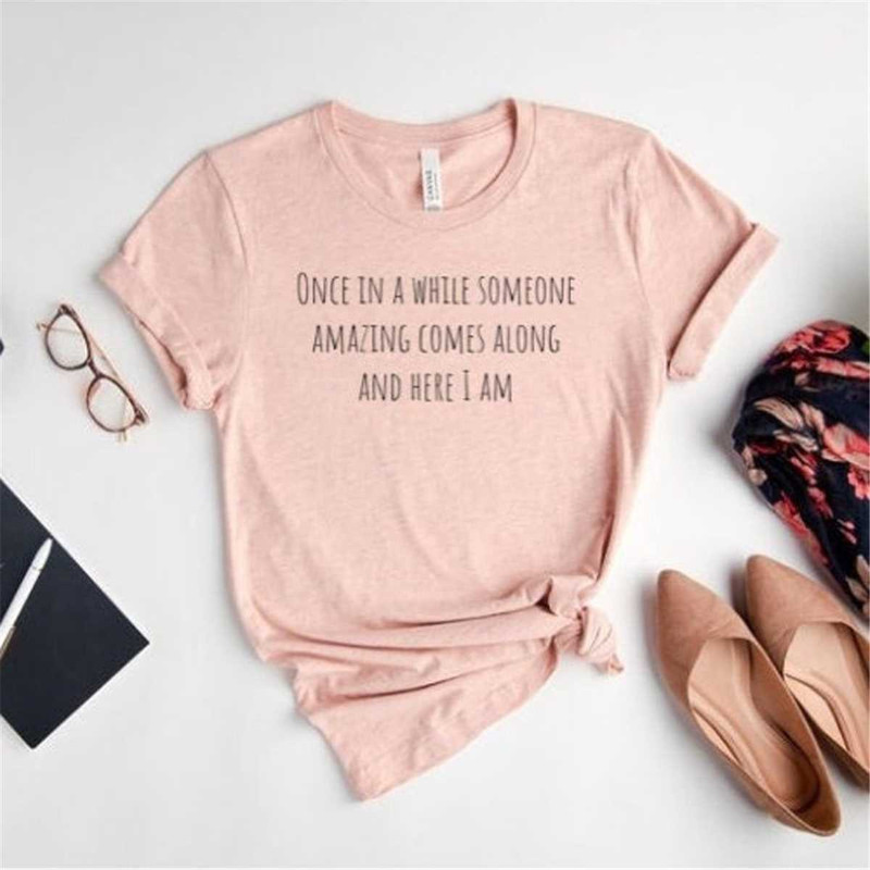 MR-204202314156-once-in-a-while-someone-amazing-comes-along-here-i-am-shirt-image-1.jpg