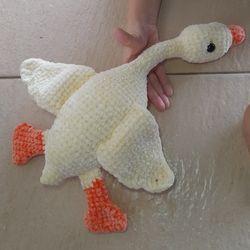 Soft plush crochet goose toy for kids.