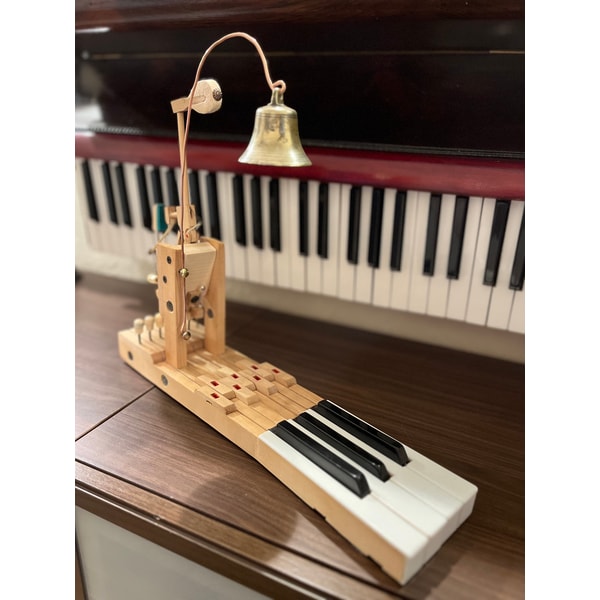 Table bell made of an old piano and an antique bell | Inspire Uplift