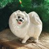 white Pomeranian  statuette