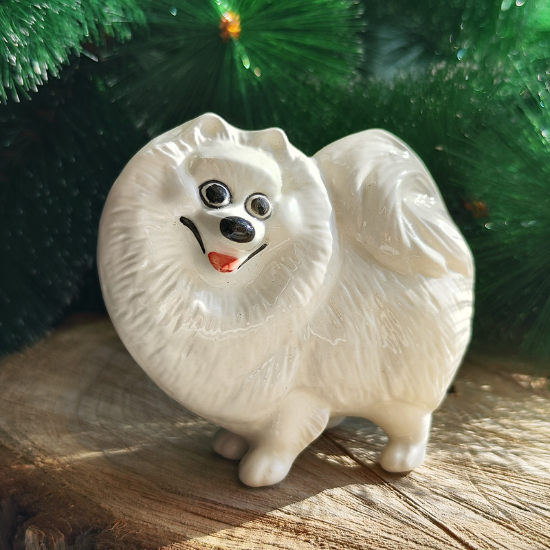 white Pomeranian statuette