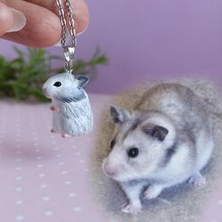 a hamster necklace of polymer clay syrian breed white and gray colors