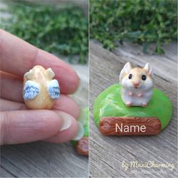 memorial angel hamster on the base with a name