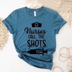 funny nurse shirt,nurses call the shots shirts,healthcare workers shirt,nurselife shirts,inspirational nurse shirt,nurse