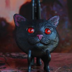 Magic cat magnet / black with red eyes