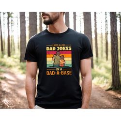 i keep all my dad jokes in a dad - a - base, vintage retro dad shirt, funny dada shirt, gifts for dad, father's day swea