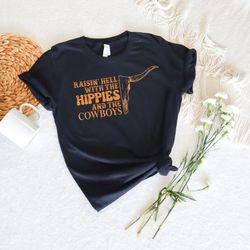 raisin' hell with the hippies and cowboys,western hippie shirt,cowboy sweatshirt,cowgirl shirt,rodeo shirt,rodeo sweatsh