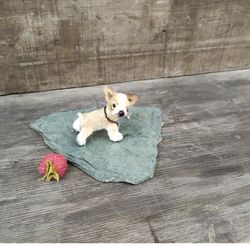 soft doll dog. miniature knitted puppy. cute dog. amigurumi toy