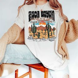 zach bryan something in the orange sweatshirt, zach bryan sweater, zach bryan shirt, zach bryan 90s rap sweatshirt, zach