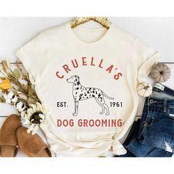 one hundred and one dalmatians cruella's dog grooming shirt / retro disney t-shirt / walt disney world shirt / disneylan