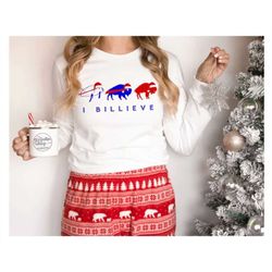 buffalo football, christmas, mafia christmas, i billieve, santa buffalo parade, long sleeve butter soft tee, dyed sassyp