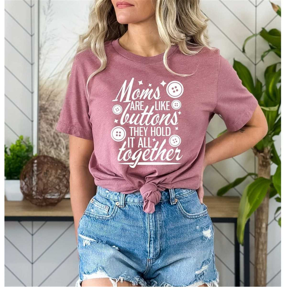 MR-65202313158-moms-are-like-buttons-they-hold-it-all-together-shirt-moms-image-1.jpg