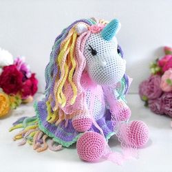 Crochet animal. Unicorn toy white, pink, blue