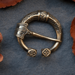 Viking fibula with Norse ornament. Viking brooch. Norse style