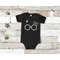 MR-65202320020-harry-potter-baby-girl-onesie-glasses-and-scar-baby-onesie-image-1.jpg