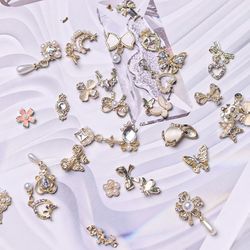 1 bag (50 pieces) random luxury dangle jewelry,  3D nail art charms , Alloy nail art dangles