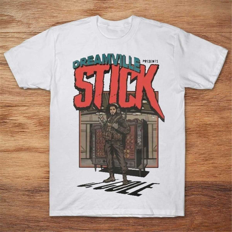MR-85202392054-j-cole-dreamville-stick-presents-shirt-vintage-j-cole-unisex-image-1.jpg