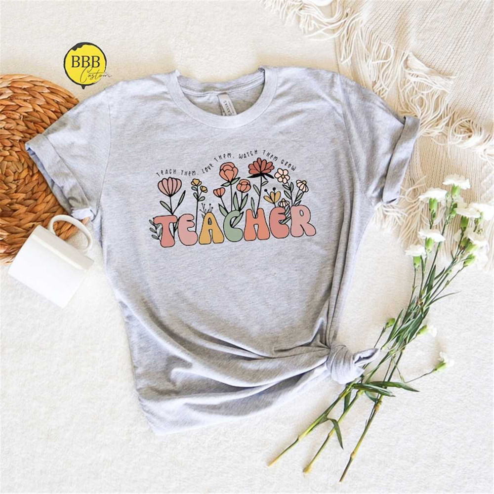 MR-85202310430-teach-them-love-them-watch-them-grow-shirt-flower-teacher-image-1.jpg