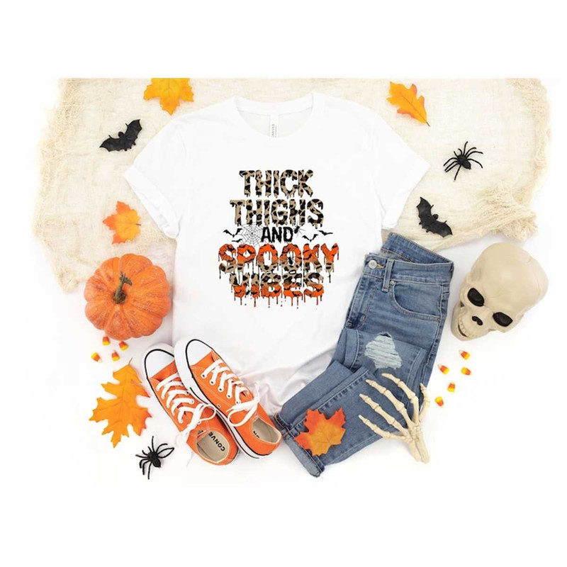 MR-852023164533-thick-thighs-and-spooky-vibes-shirt-funny-halloween-shirt-image-1.jpg