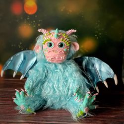 dragon toy. fantasy creature doll clay.