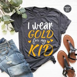 childhood cancer graphic tees, gold ribbon crewneck sweatshirt, cancer survivor t-shirt, cancer awareness gift, pediatri