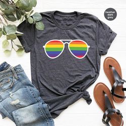 pride month tees, lgbtq sunglasses outfit, funny gay shirts, lesbian vneck tshirts, pride month outfit, trans gifts, rai