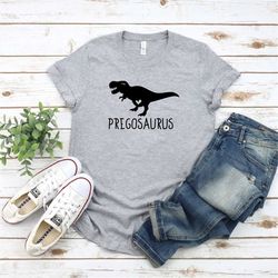 pregosaurus t-shirt, funny maternity t-shirt, pregnancy announcement t-shirt, pregnancy reveal dinosaur shirt, baby anno