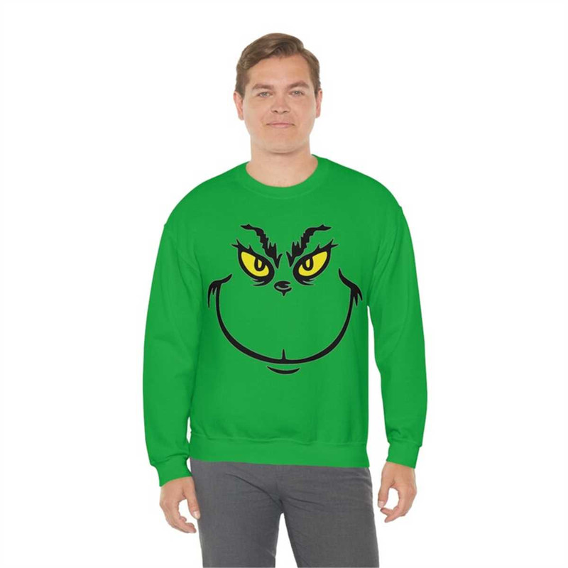 MR-95202317273-grinch-face-unisex-heavy-blend-crewneck-sweatshirt-image-1.jpg