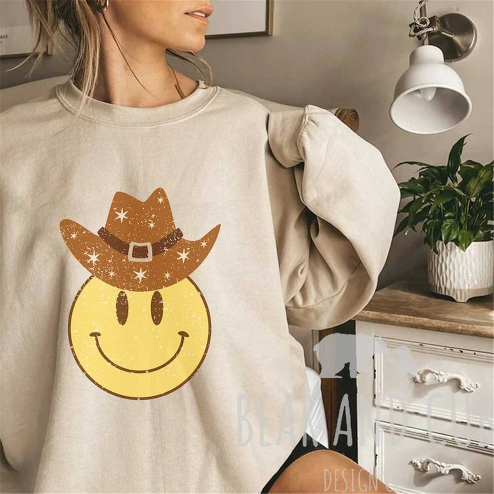 MR-9520231832-smiley-face-cowboy-hat-crewneck-sweatshirt-howdy-cowboy-tee-image-1.jpg