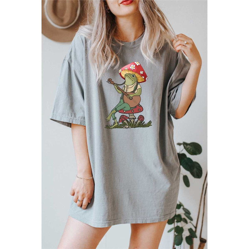 MR-10520239649-mushroom-head-frog-playing-guitar-on-a-mushroom-oversized-light-grey.jpg