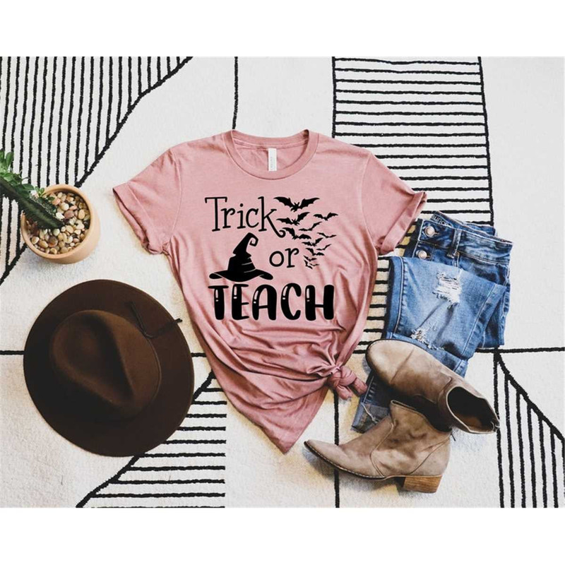 MR-1052023113127-trick-or-teach-halloween-teacher-shirt-halloween-outfit-image-1.jpg