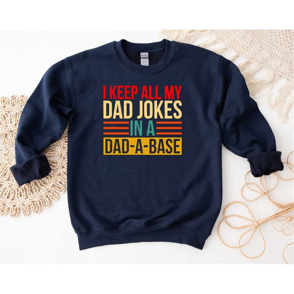 MR-1052023125934-i-keep-all-my-dad-jokes-in-a-dad-a-base-shirt-dad-sweatshirt-image-1.jpg