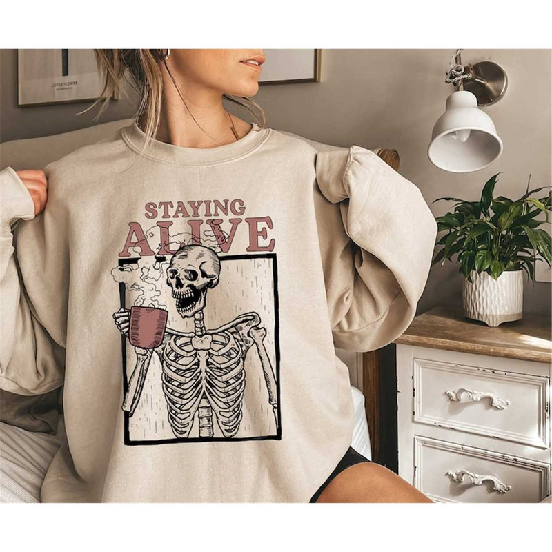 MR-115202305945-staying-alive-halloween-costume-skeleton-shirt-funny-image-1.jpg