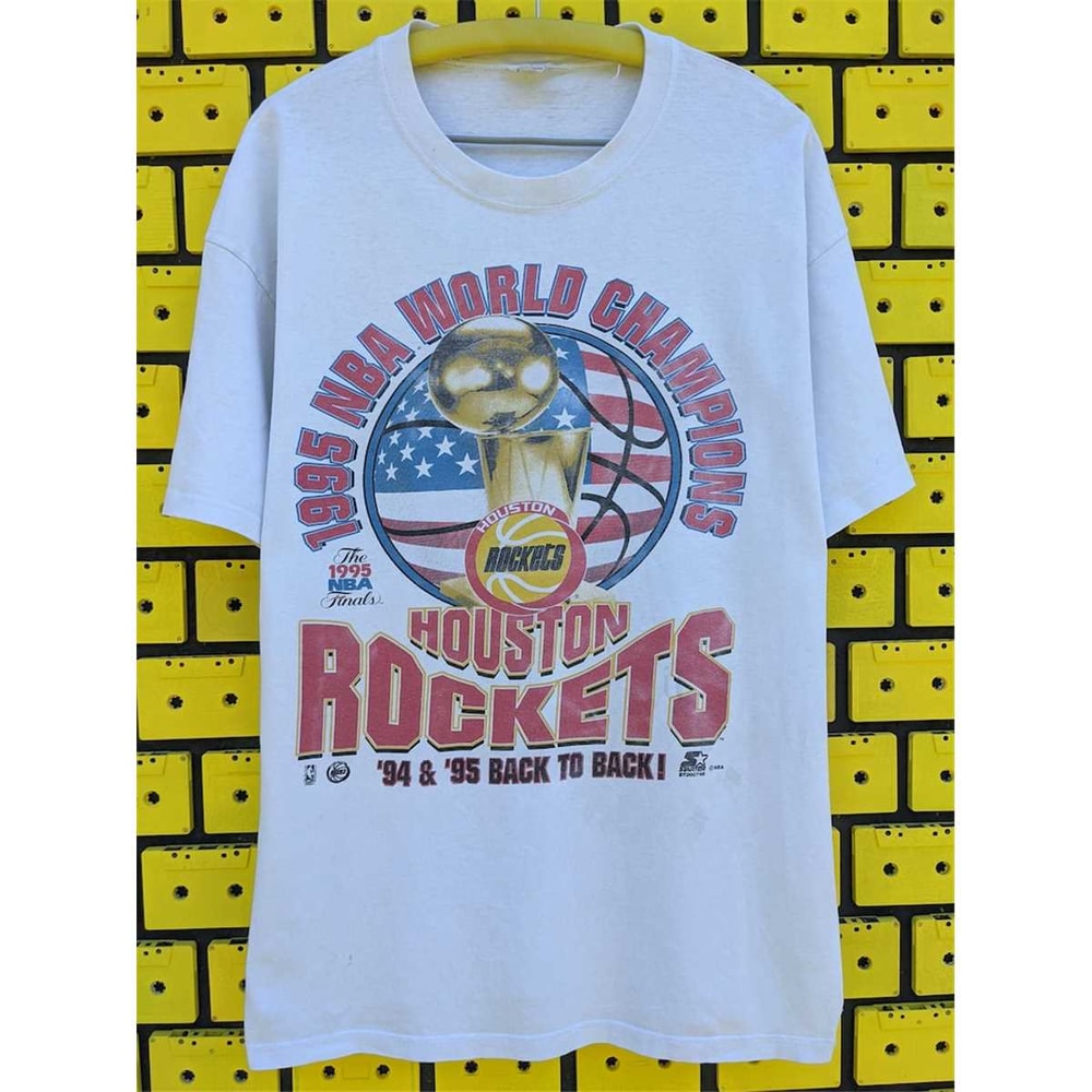 MR-11520239513-vintage-1995-houston-rockets-t-shirt-nba-world-champions-image-1.jpg