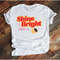 MR-115202318536-shine-bright-like-a-super-bowl-ring-unisex-t-shirt-super-bowl-image-1.jpg