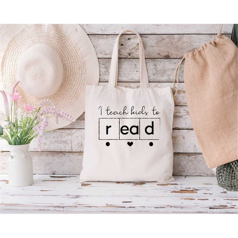MR-1152023191018-i-teach-kids-to-read-tote-bag-teacher-gift-tote-reading-image-1.jpg