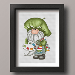 Artist gnome cross stitch pattern PDF, Painter cross stitch, Painter gnome, Painting cross stitch, Counted cross stitch