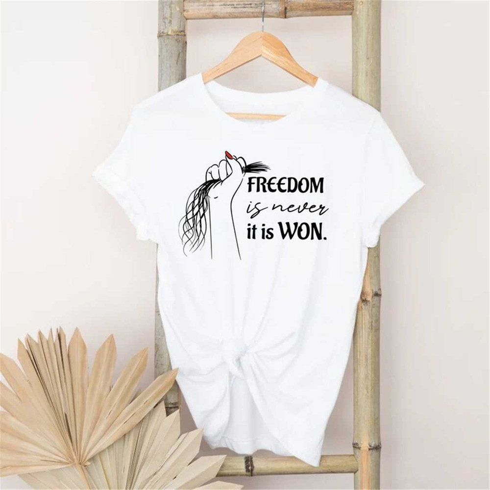 MR-135202313405-freedom-is-never-given-it-is-won-sweatshirt-pray-for-masha-image-1.jpg