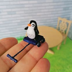 Penguin on a cart. Doll miniature.1:12.
