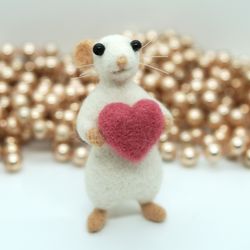 Miniature needle felted mouse with a heart