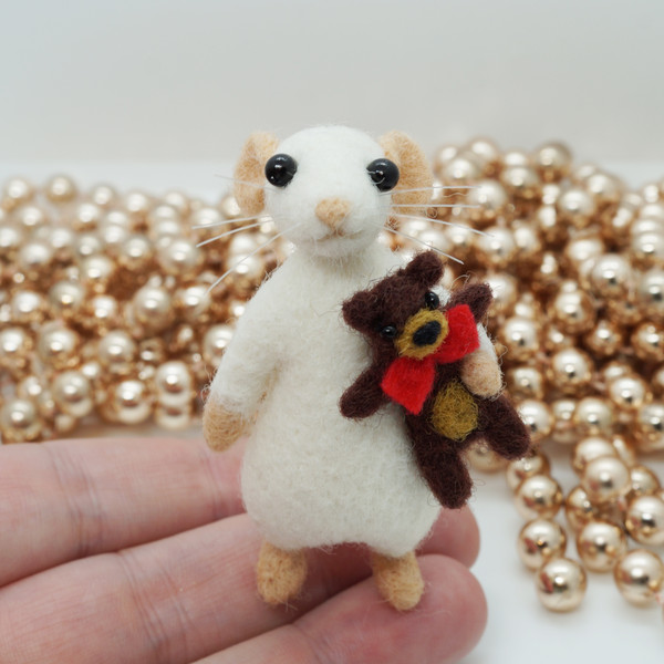 mouse-with-teddy-bear-figurine