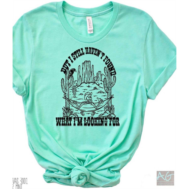 MR-1752023115425-still-havent-found-what-im-looking-for-graphic-tee-image-1.jpg