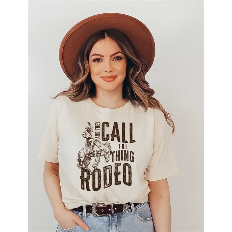 MR-1752023143746-and-they-call-the-thing-rodeo-garth-brooks-inspired-tahirt-image-1.jpg