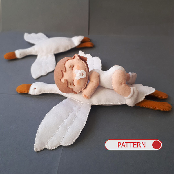 Baby doll and goose hugging fairytale nursery sewing pattern.jpg